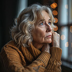 Thoughtful, thinking and senior woman at window in a home for the morning view, idea or calm. Sad, depressed and an elderly person with hope while in a house during retirement and vision for old age.