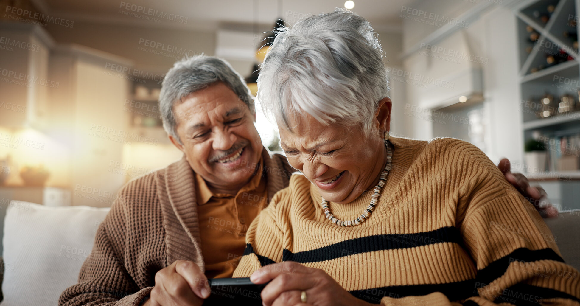 Buy stock photo Senior couple, selfie and smile on couch, hug and bonding with love, check post and relax in retirement in home. Elderly woman, man and laugh with profile profile, web blog and social media on sofa