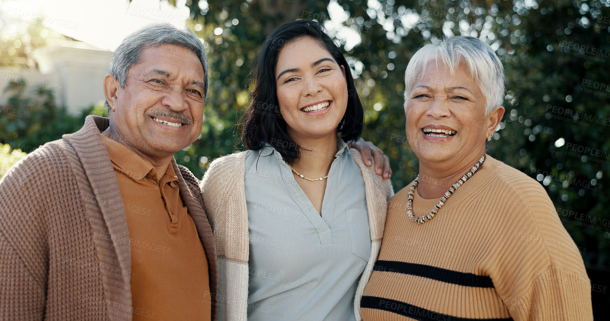 Buy stock photo Nature, face and woman with her senior parents in a garden for family bonding together. Smile, care and portrait of female person hugging elderly man and woman in retirement with love in outdoor park