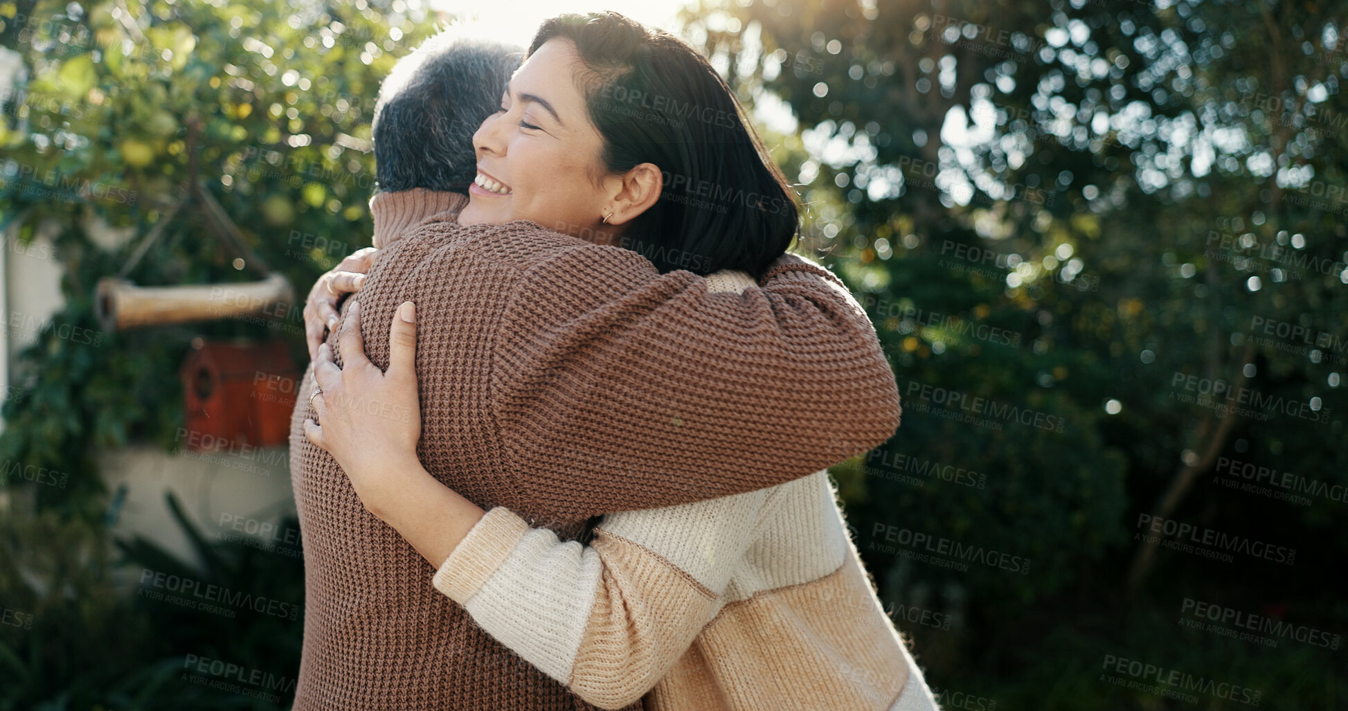 Buy stock photo Family, hug and a senior father with his daughter in the garden of a home together for bonding during a visit. Love, smile and retirement with an elderly man embracing a woman outdoor in the backyard