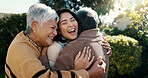 Mexican family, hug and smile for reunion, outdoors and love for support, retirement and care. Elderly parents and daughter, visit and happy in backyard, bonding and embrace for quality time at home