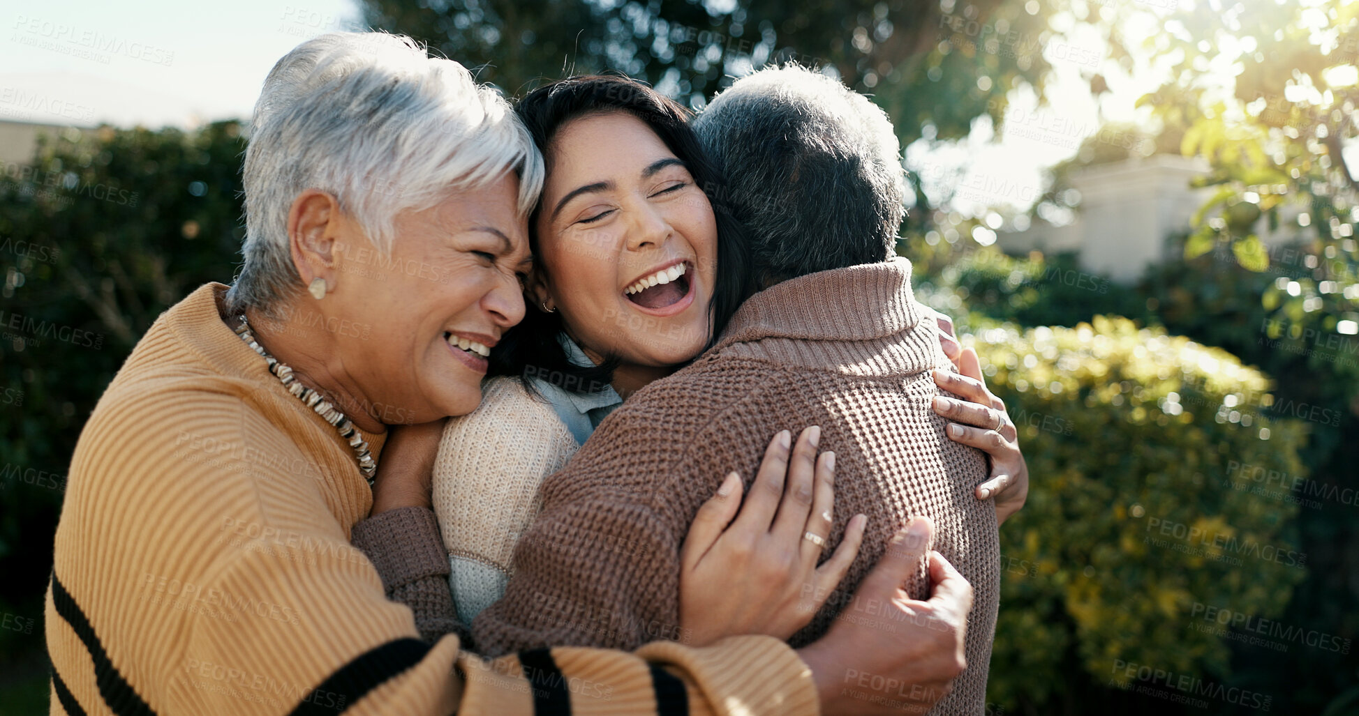 Buy stock photo Mexican family, hug and smile for reunion, outdoors and love for support, retirement and care. Elderly parents and daughter, visit and happy in backyard, bonding and embrace for quality time at home