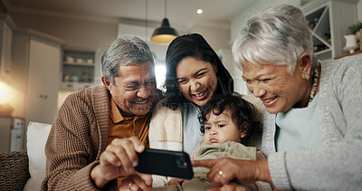 Selfie, woman and senior parents with child bonding together on a sofa for relaxing at home. Happy, smile and female person taking a picture with elderly people in retirement and baby in the lounge.
