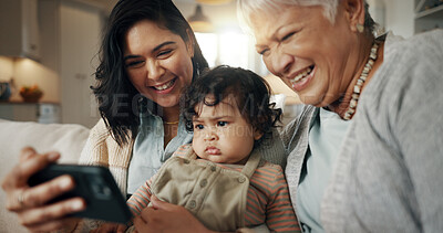 Selfie, woman and senior grandmother with baby bonding together on a sofa for relaxing at home. Happy, smile and female person taking a picture with elderly person in retirement with child in lounge.
