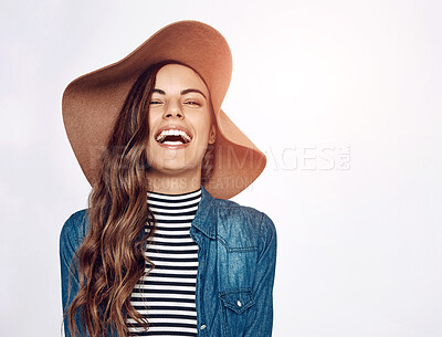 Buy stock photo Fashion, happy and portrait of woman in studio with stylish, trendy and casual outfit for confidence. Laughing, mockup and female person from Canada with hat and chic clothes by white background.