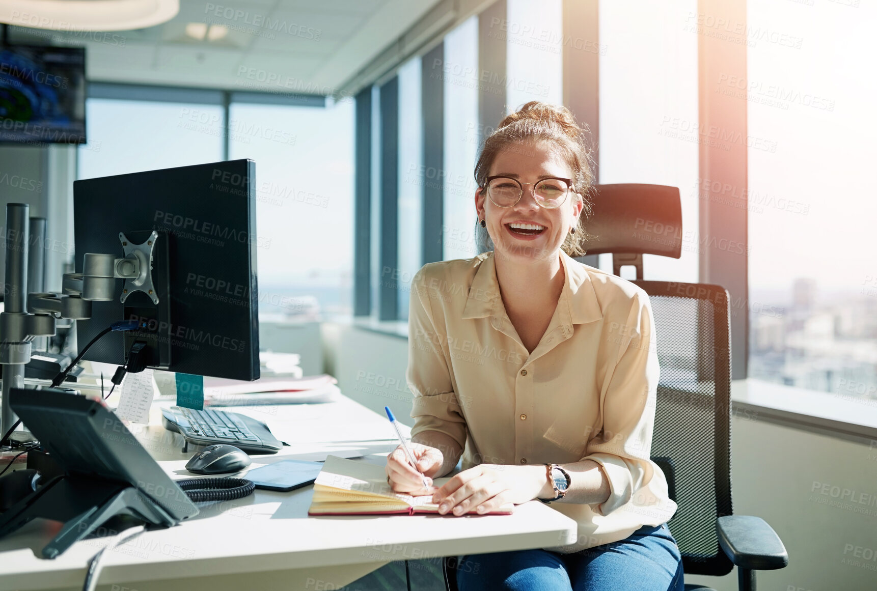 Buy stock photo Laugh, woman and desk for notes, fun and paperwork with window in office for scheduling. Ideas, planning and female person or receptionist with journal, agenda or calendar for business administration