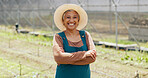 Farmer, mature or face of happy woman with arms crossed or pride in agriculture farming or gardening. Nature, land or business owner with organic crops or food production in eco friendly greenhouse