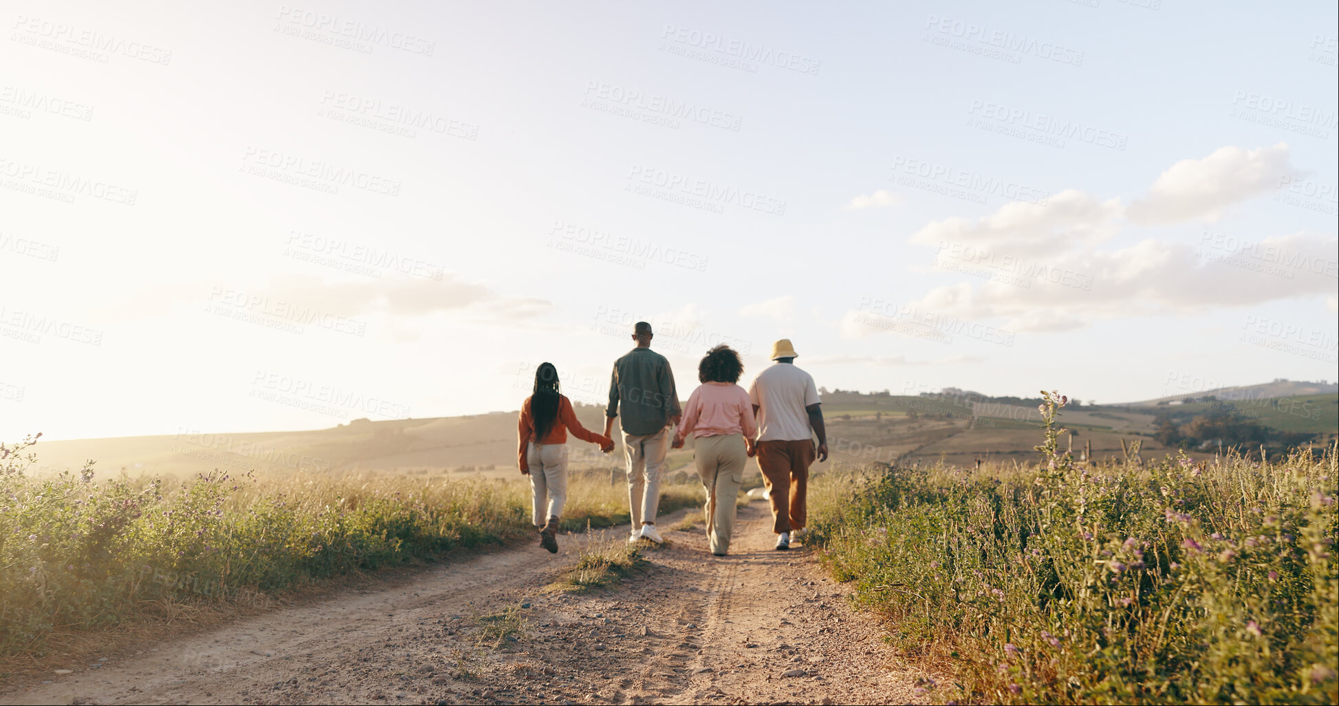 Buy stock photo Group, friends and holding hands with vacation, back and summer break with adventure, fresh air and journey. People, outdoor and holiday with road trip getaway, trust and nature with mountains