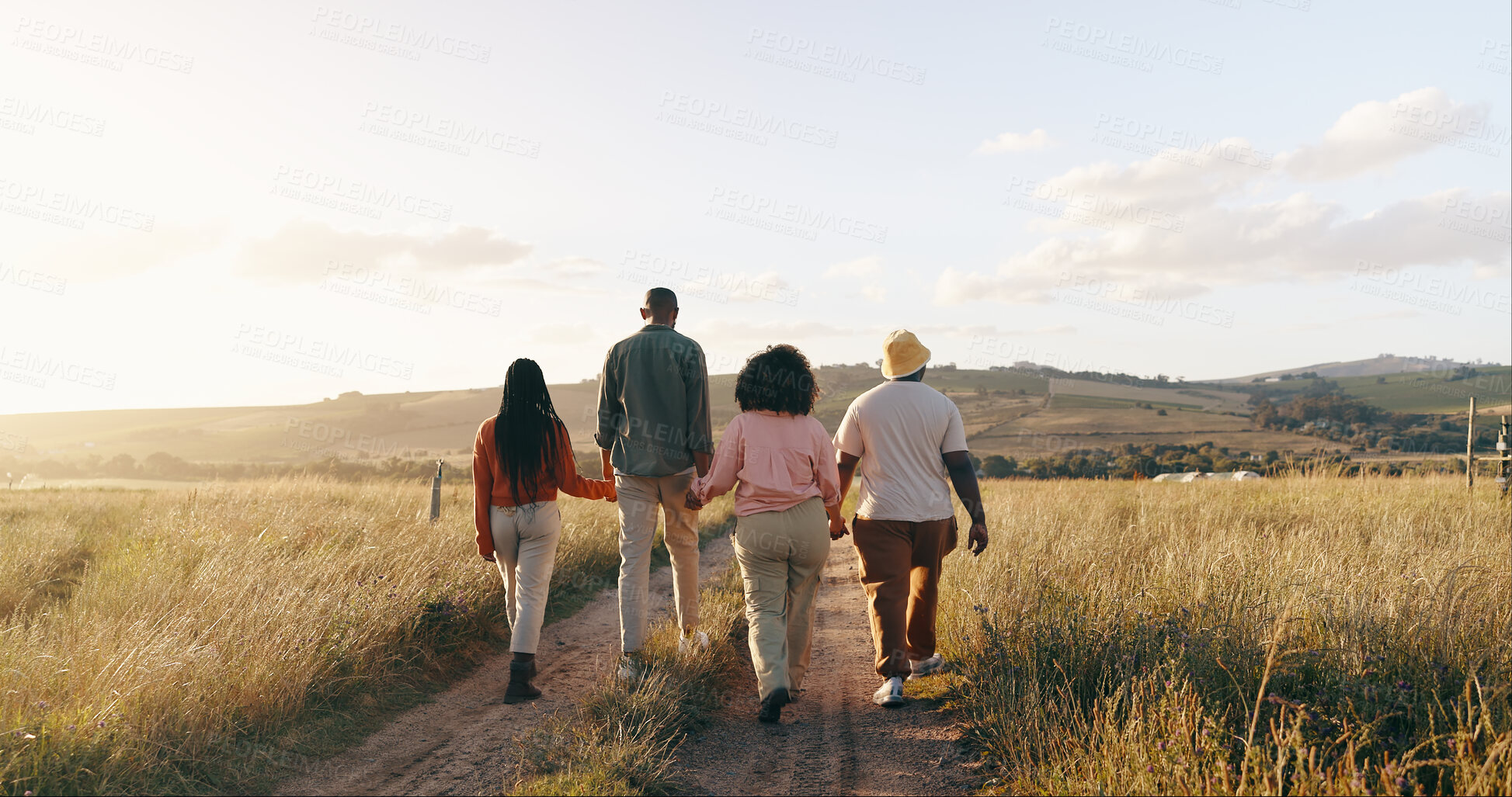 Buy stock photo Group, friends and holding hands with vacation, back and summer break with adventure, fresh air and journey. People, outdoor and holiday with road trip getaway, trust and nature with mountains