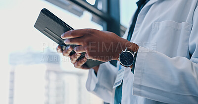 Hands, tablet and doctor in hospital for online consulting, telehealth or wellness app update. Man, healthcare medicine or closeup of nurse typing for internet tips, medical research or patient data