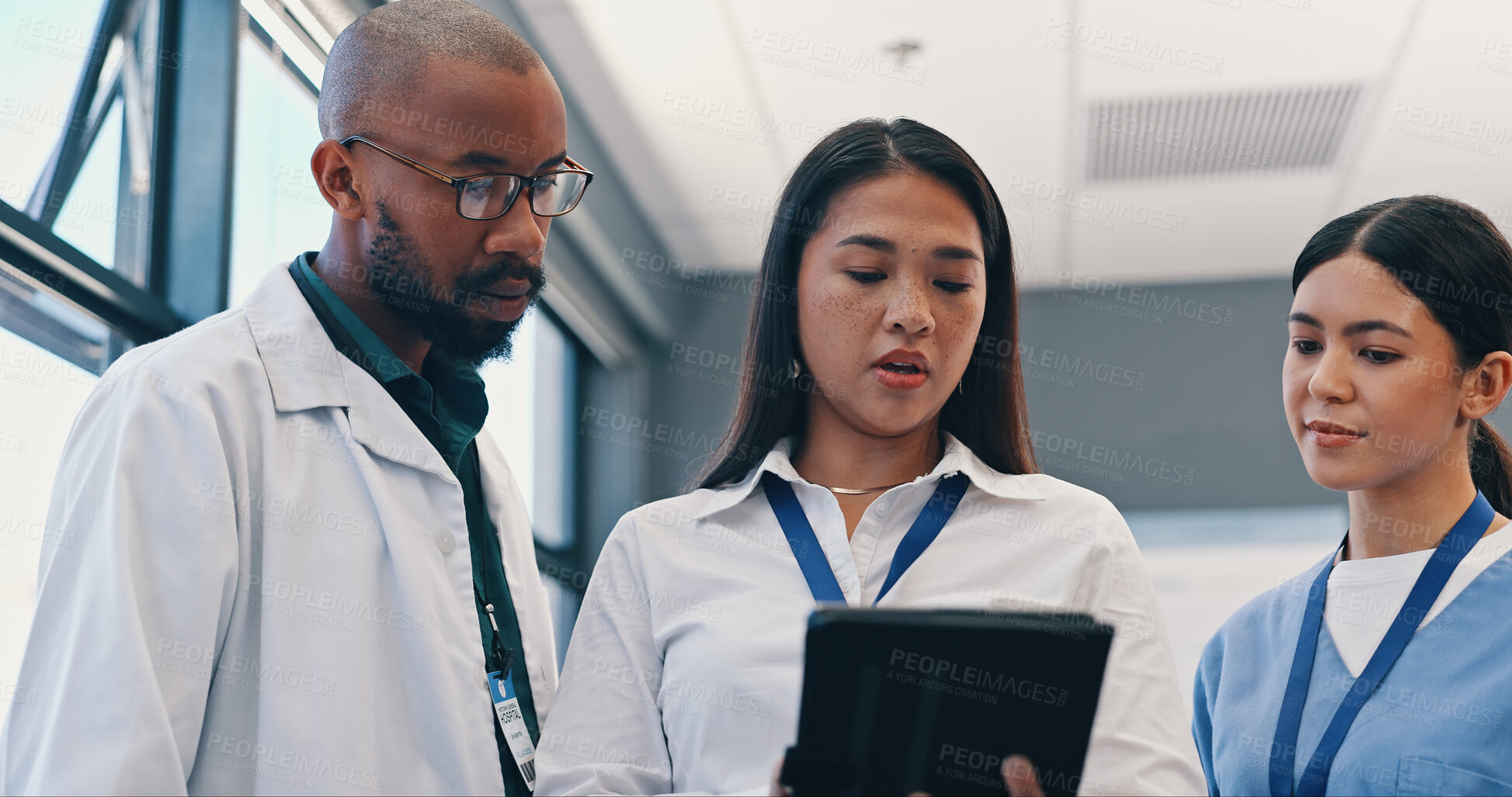 Buy stock photo Medical team, tablet and communication in hospital with doctor, meeting and diversity at work. Healthcare, nursing and health support staff with tech for patient info or test results and discussion.
