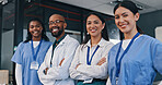 Doctors, group and happy with arms crossed in hospital with confidence in medical goals or mission. Healthcare, team and portrait of people in clinic working in medicare with pride and diversity