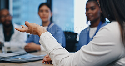 Buy stock photo Team, meeting and hands of doctors in discussion for planning, surgery update and diagnosis in boardroom. Medicine, medical group and people talking in clinic office for solution and collaboration