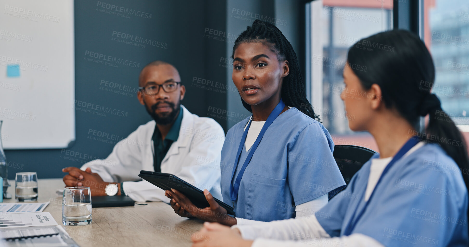 Buy stock photo Healthcare, tablet and teamwork in meeting for talking, planning and research for collaboration in hospital. Medical, nurses and doctor with internet for communication, news report or feedback