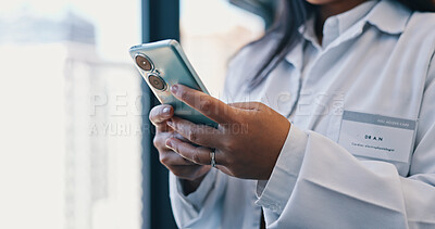 Closeup, hands or doctor in hospital with phone for research, telehealth or medical consulting. Social media update, woman or health worker with mobile app for patient data, wellness or internet