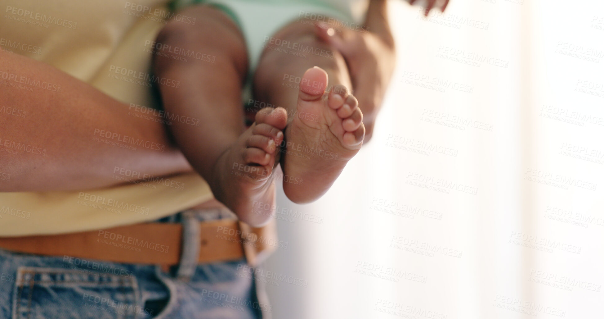 Buy stock photo Hands, baby and feet closeup in home for parent support or development bonding, wellness or love. Fingers, toes and foot carrying for playful connection or youth care for happiness, trust or rest