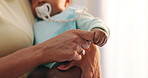 Love, baby and mother holding hands in a house with care, trust and security closeup while bonding. Children, safety and mama with kid at home with support, protection or calm, moment or nap routine