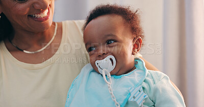 Buy stock photo Cute, bonding and mother holding baby with pacifier for calming with love and care at family home. Trust, embracing and closeup of mom carrying sweet boy infant, child or newborn in modern house.