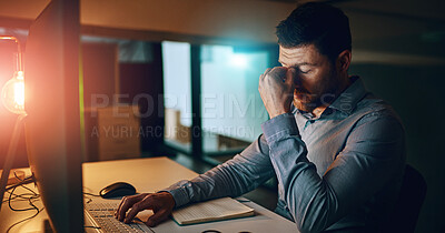 Buy stock photo Anxiety, night and businessman at desk by computer for fatigue, overtime or project deadline in office. Stress, publishing agency and employee with headache for exhausted, report or decision in dark