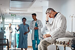 Hospital, stress and doctor with headache, healthcare and mistake with failure and overworked with fatigue. Clinic, medical or professional with pain or tired with migraine or burnout with depression