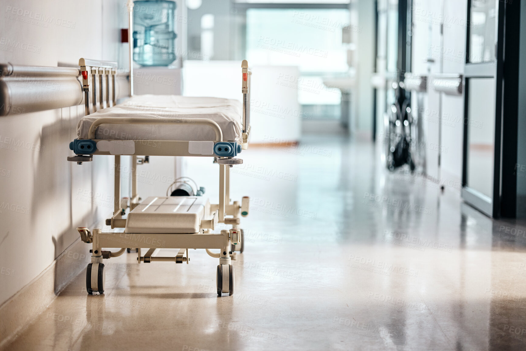 Buy stock photo Ward, hospital and bed in a lobby, healthcare or wellness with furniture or interior with help or risk. Hallway, clinic or emergency service with surgery or medical center with bacteria or facility