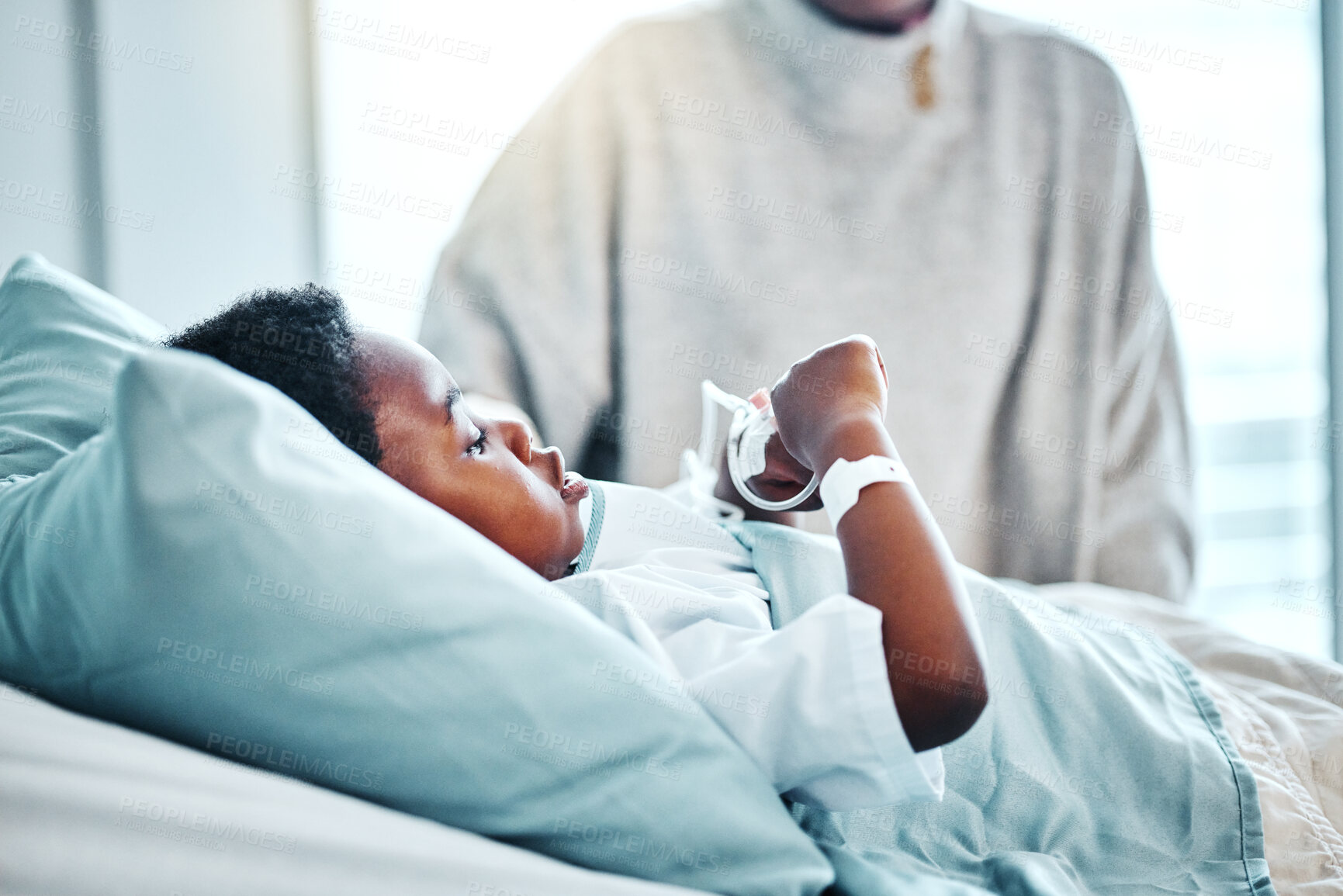 Buy stock photo Medical, sick and child in bed in hospital for recovery of surgery, illness or diagnosis. Healthcare, healing and young African kid patient resting for injury or virus treatment in pediatric clinic.