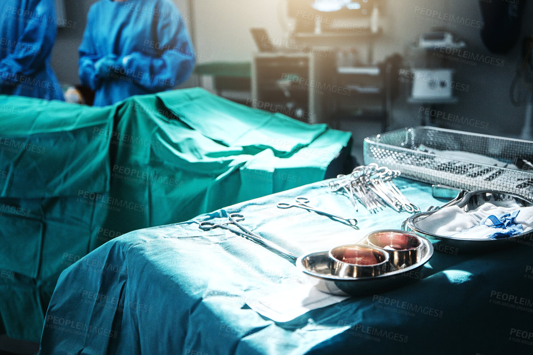 Buy stock photo Surgery, table and equipment for procedure in hospital for medical transplant treatment. Healthcare, scissors and blur of surgeons working with metal surgical tools for operation at medicare clinic.