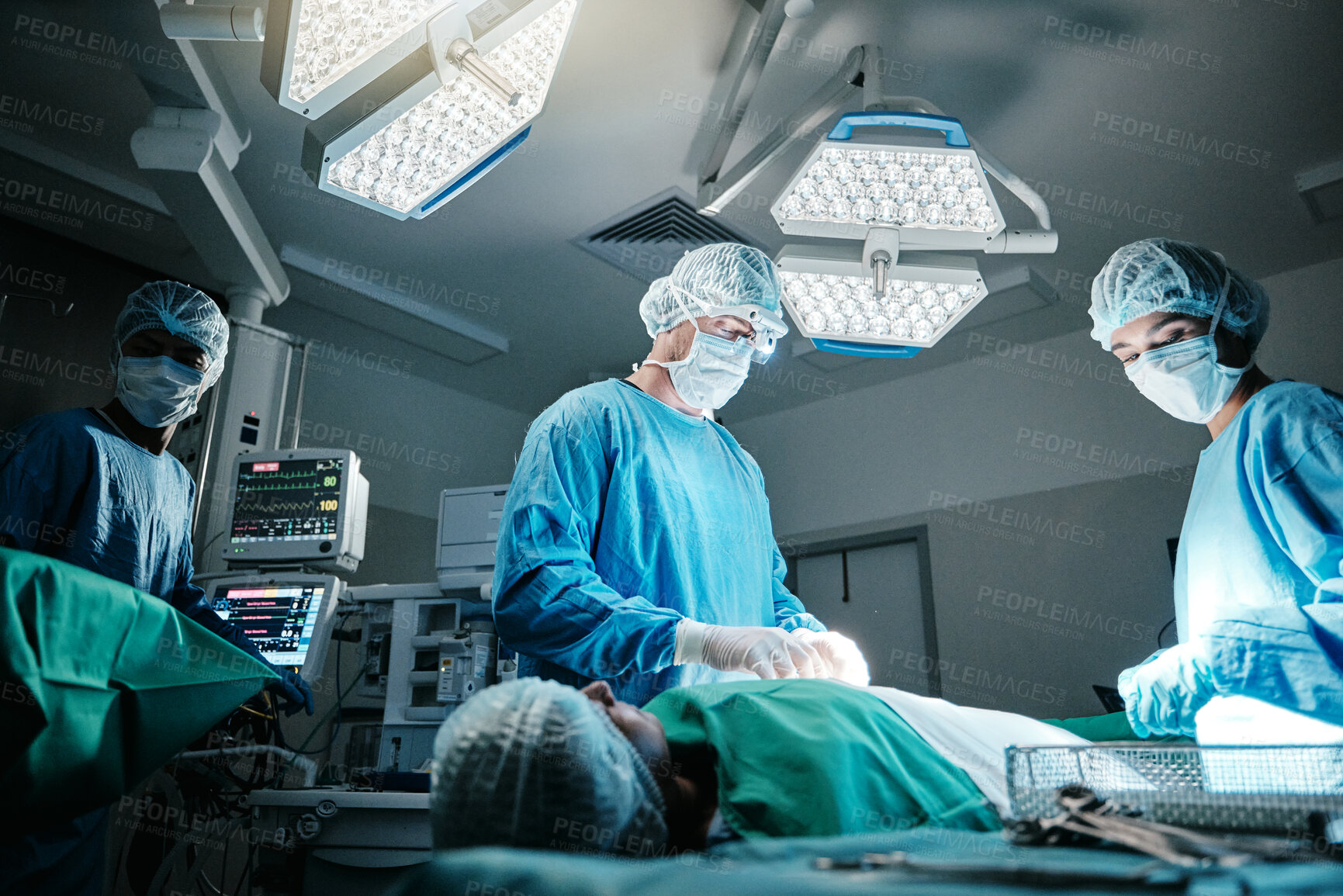 Buy stock photo Doctor, surgeon and patient in hospital, theater and emergency room busy with operation in medical career. Healthcare, nurse and workers with staff for surgery, medicine and health in clinic