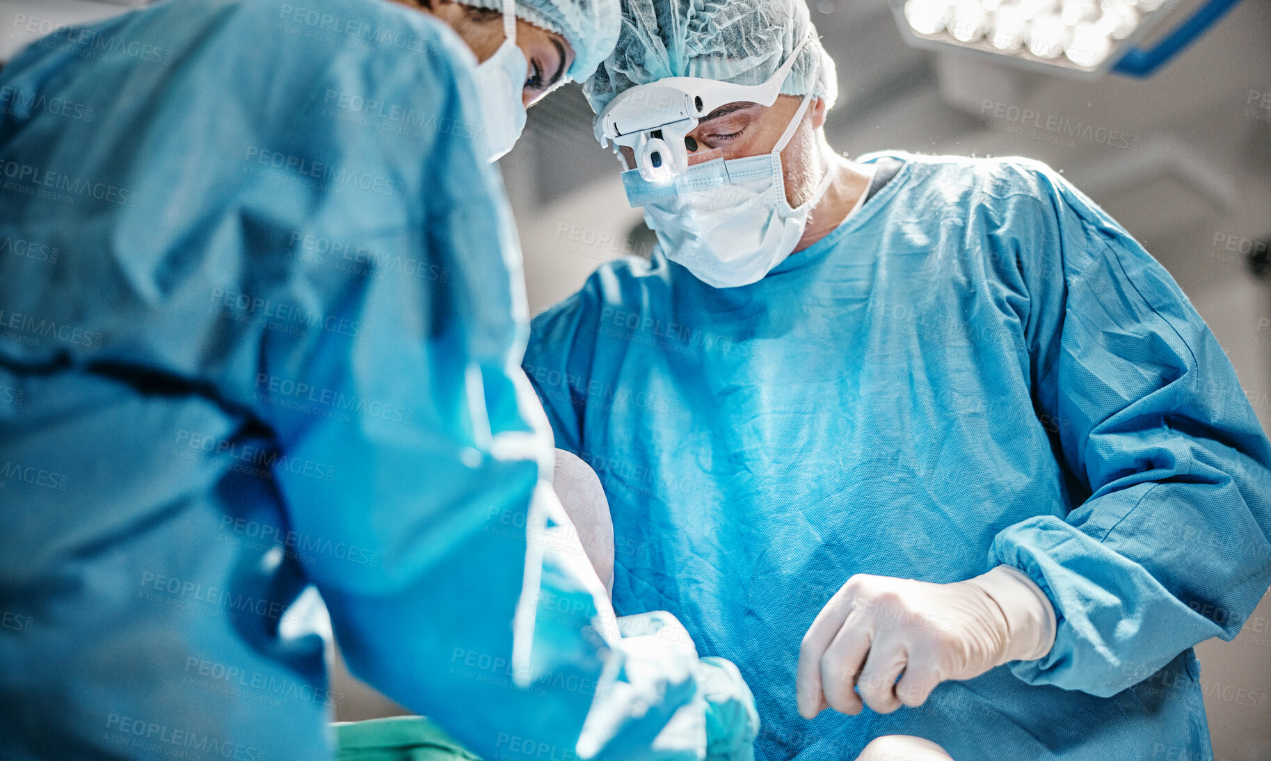 Buy stock photo Theatre, operation or surgeons with teamwork for emergency, people or healthcare help in hospital clinic. Surgery procedure, icu or doctors in surgical collaboration in operating room to support