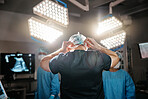 Medical, clothes and doctor in operating room for surgery, safety and protection in theatre. Healthcare, surgeon and preparation with uniform for emergency, procedure and operation in hospital