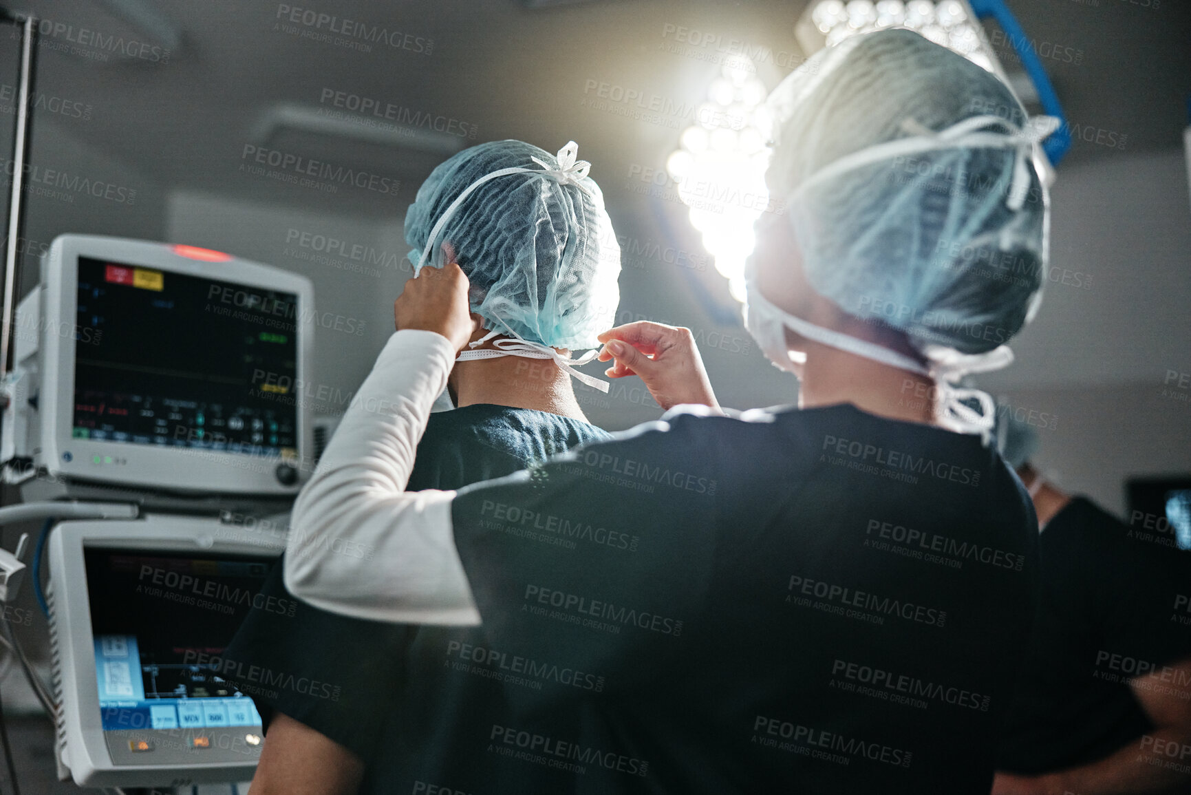 Buy stock photo Healthcare, uniform and surgeon in theatre for surgery, protection and preparation in hospital. Medical professional, doctor and help with clothes for support, safety and procedure in operating room