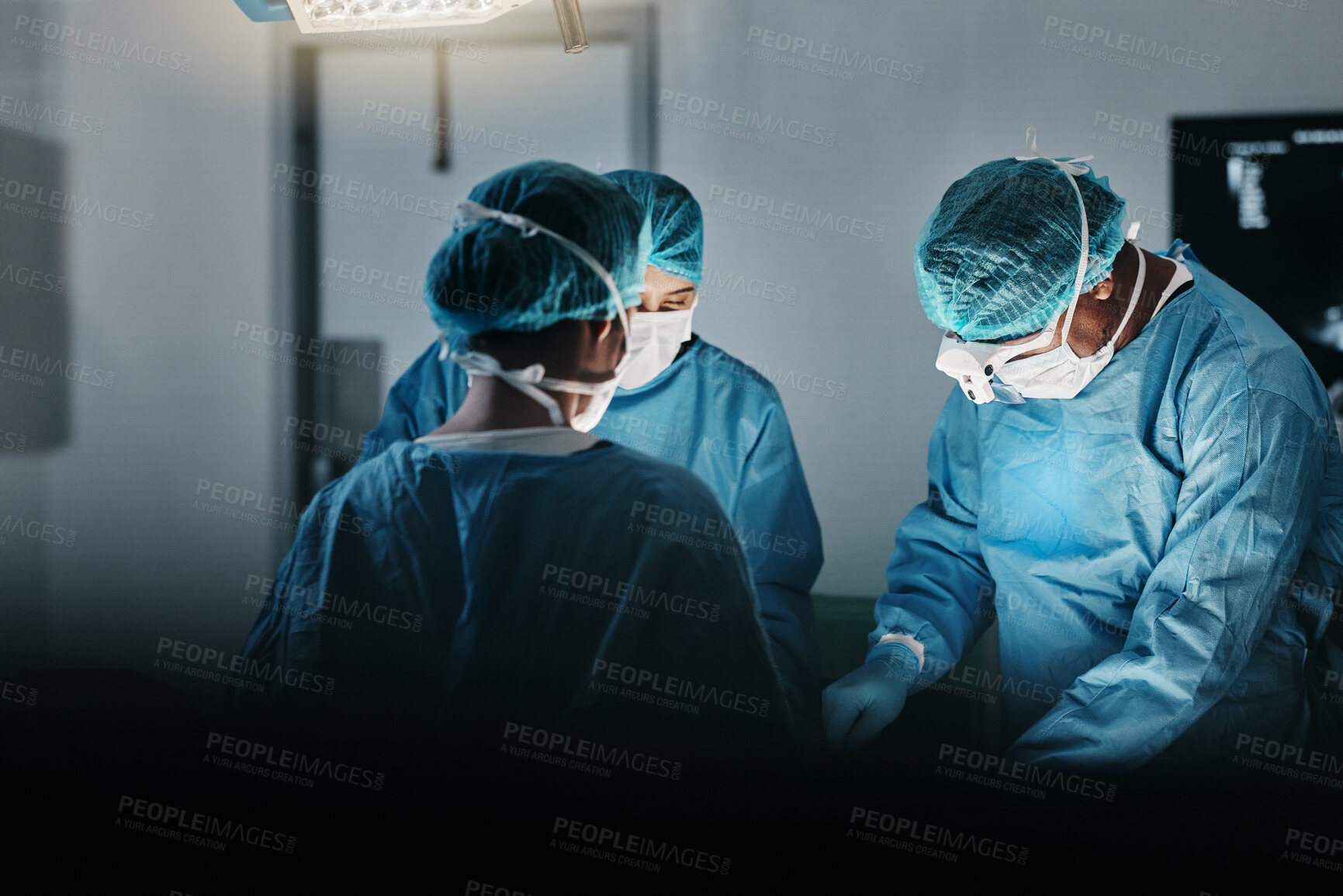 Buy stock photo Surgeon team, people and operating room at hospital in scrubs, ppe and help for emergency healthcare procedure. Doctors, group and together in icu, medical surgery and services for wellness at clinic