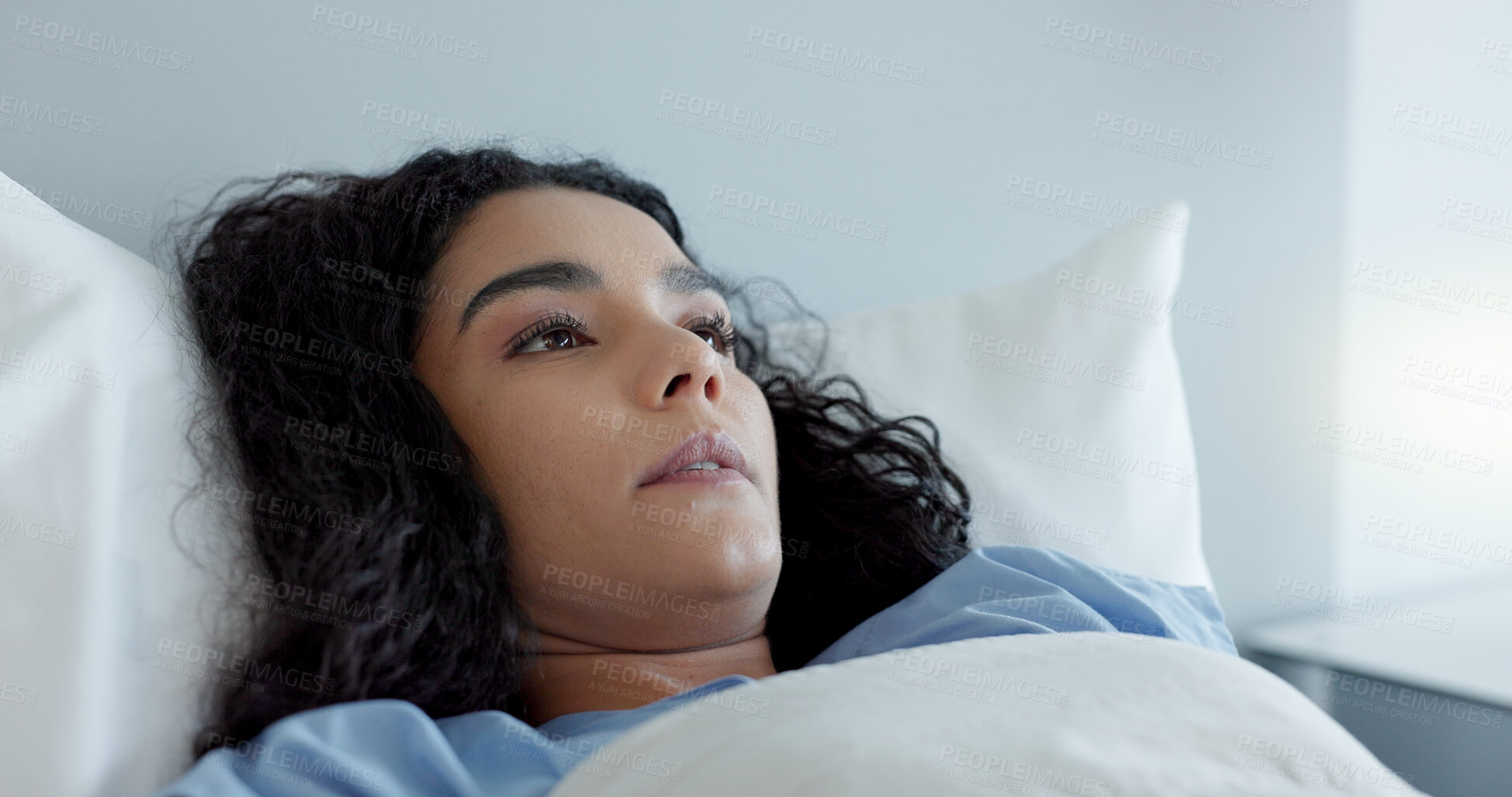 Buy stock photo Woman, bed and tired in hospital, wake up and fear for results of medical test, exam or update on wellness. Sick girl, worry and anxiety with choice, decision or fatigue in clinic, healthcare or icu