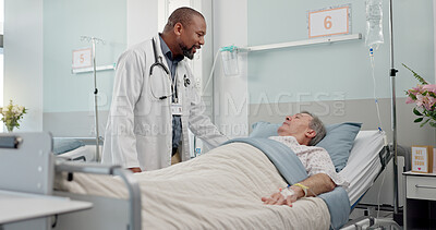 Consultation, healthcare and doctor with patient in hospital after surgery, treatment or procedure. Discussion, checkup and African male medical worker talk to senior man in clinic bed for diagnosis.