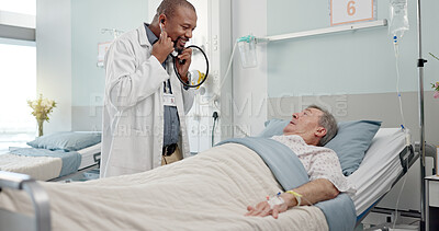 Consultation, stethoscope and doctor with patient in hospital after surgery, treatment or procedure. Discussion, checkup and African male medical worker talk to senior man in clinic bed for diagnosis