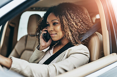 Buy stock photo Shot of an attractive businesswoman on a call during her morning commute