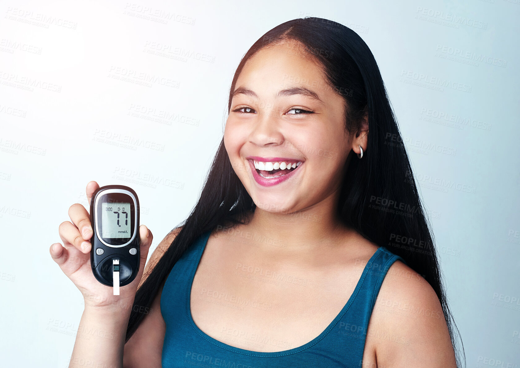 Buy stock photo Portrait, girl and kid with diabetes machine, strip and showing results on white studio background. Face, model and child with monitor for blood sugar, medicine and health with glucose levels or test