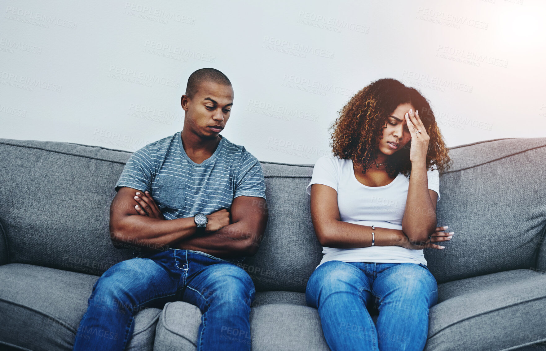 Buy stock photo Frustrated couple, sofa and divorce with fight in disagreement, conflict or argument for cheating affair at home. Man or woman in toxic relationship, breakup or ignore in living room dispute at house