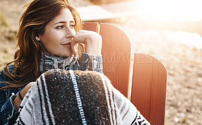 Buy stock photo Thinking, nature and woman on deck chair for peace, calm and relax on holiday outdoor. Vacation, travel and person with blanket in winter for dream, remember memory and tourist with view in Spain