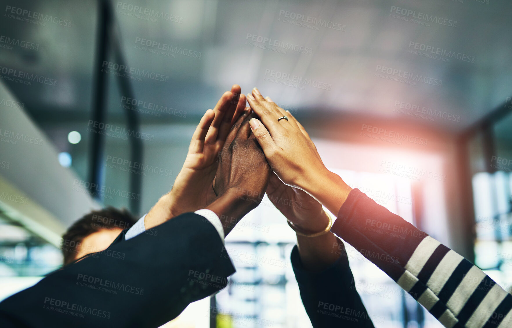 Buy stock photo Hands up, together and diversity in office with teamwork for business, inclusion or commitment for job. Group, people and fingers in huddle with collaboration for team building, staff with solidarity