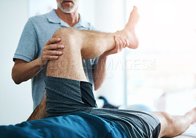 Buy stock photo Healthcare, leg and physiotherapist with man patient in clinic for healing, rehabilitation or treatment. Physical therapy, stretch and medical worker with athlete for knee injury or accident recovery