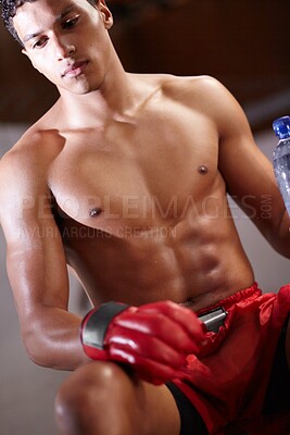 Buy stock photo Boxing, man and thinking of workout or fight in the ring for a match or training in gym. Health, fitness and strong fighter exercise for sports or rest break in rounds of fighting competition