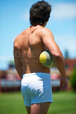 Buy stock photo Back, rugby and player with ball on a field ready for a competitive practice game. Topless and male person with an object for exercise or training from behind and shirtless playing outside for sport