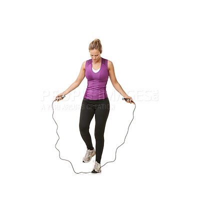 Buy stock photo Fitness, skipping rope and woman on a white background for training, cardio workout and exercise. Sports, endurance and isolated person with gym equipment for health, wellness and jumping in studio