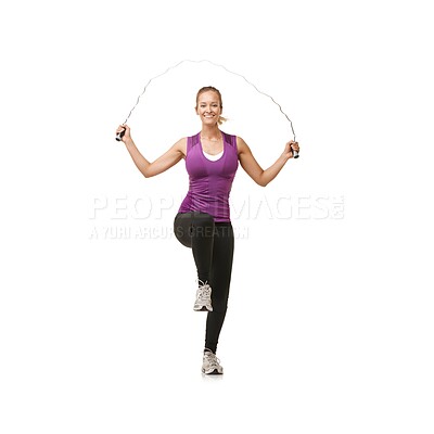 Buy stock photo Portrait, skipping rope and woman on a white background for exercise, cardio workout and training. Sports, fitness and isolated person with gym equipment for health, wellness and jumping in studio