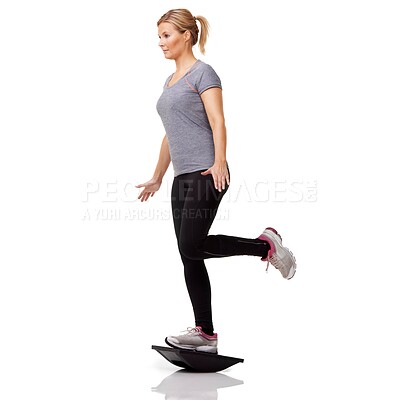 Buy stock photo Fitness, studio and woman with balance board, muscle and healthy body workout at gym. Exercise, stability and girl with wellness, pilates training tools and commitment isolated on white background.