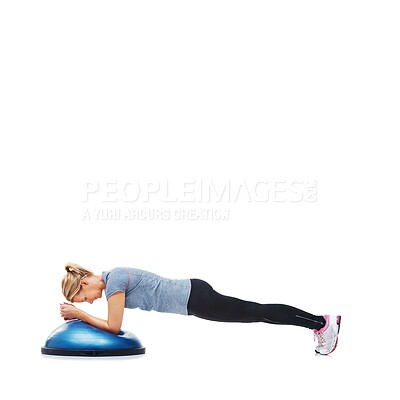 Buy stock photo Woman, fitness and half ball for plank in studio for training, strong exercise and gym with muscle health on floor. Person or young sports model in shoulder or arms workout on a white background