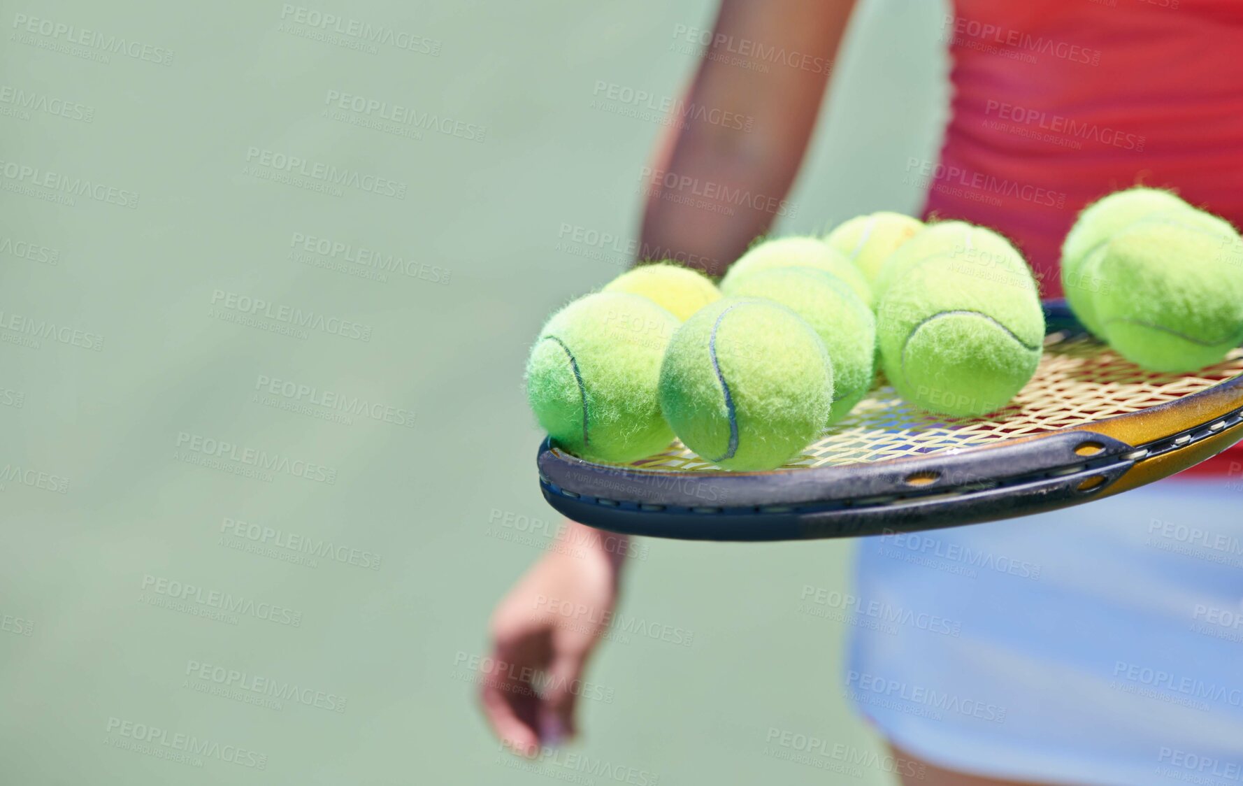 Buy stock photo Woman, tennis player and balls on racket for outdoor game, match or competition on court. Closeup or hands of female person or athlete in sports with bat and equipment for training on mockup space