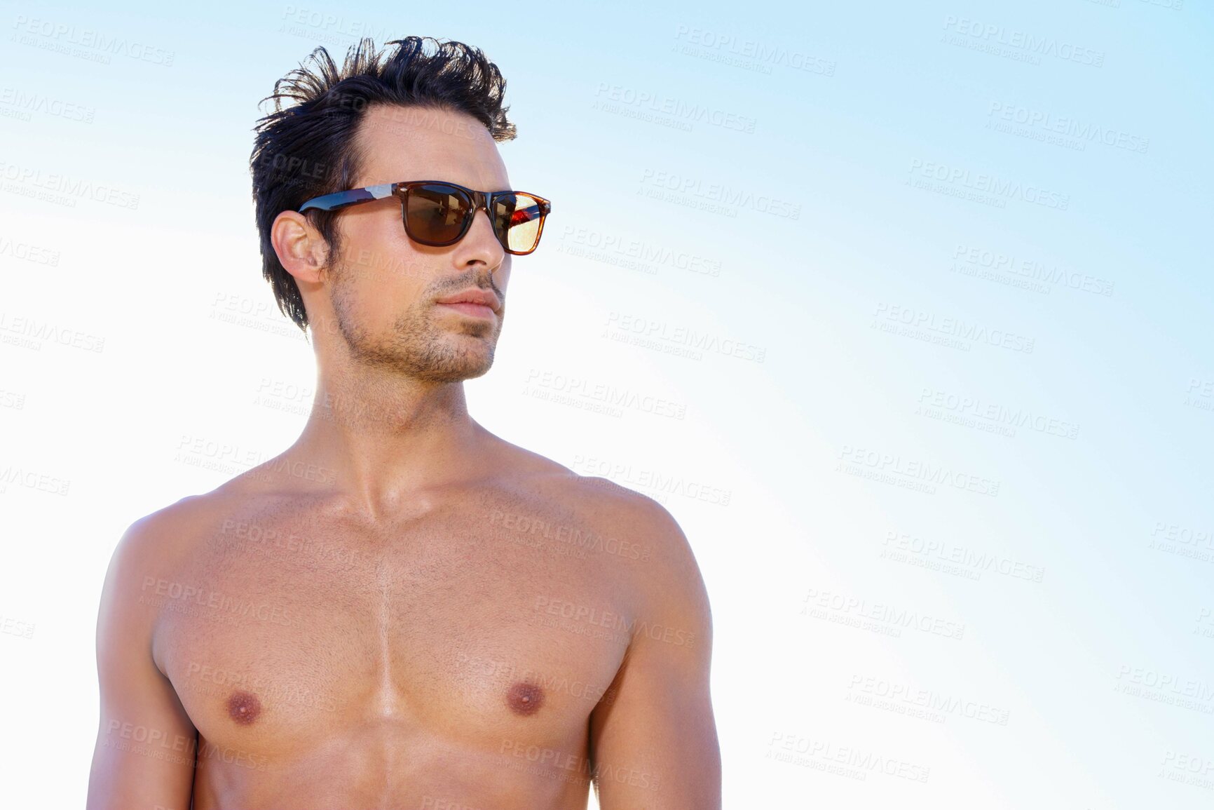 Buy stock photo Muscular, shirtless and man with sunglasses and sky background with mockup space, shine and chest. Person, outdoor or vacation with funky eyewear and tattoo with holiday, getaway trip or summer break