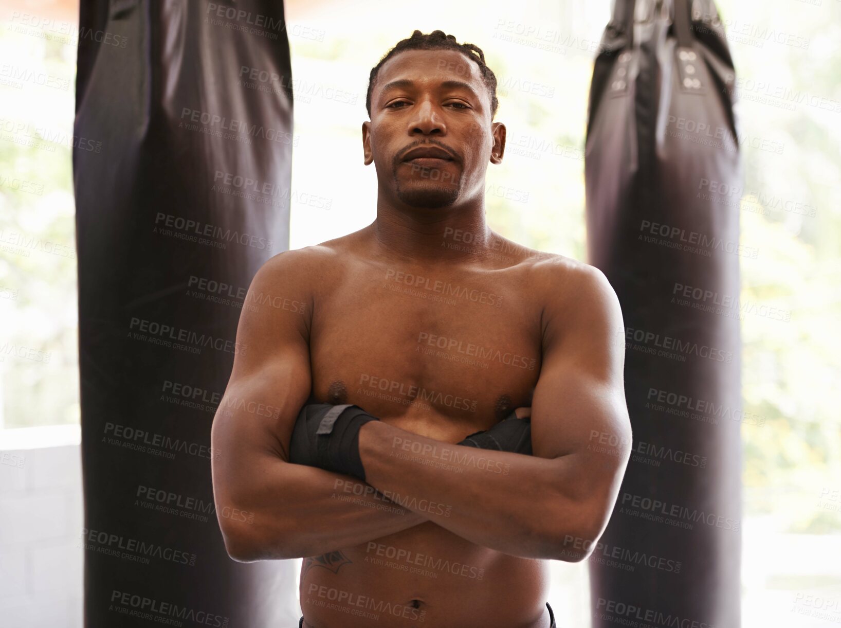 Buy stock photo Fitness, boxing and portrait of black man in gym for challenge, arms crossed and competition training. Power, muscle and serious face of champion boxer at workout with confidence in sports club.